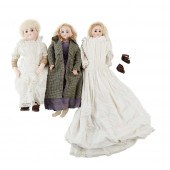 THREE BISQUE DOLLS comprising