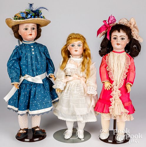 THREE BISQUE HEAD DOLLSThree bisque