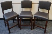 THREE BLACK LEATHERETTE STAINE