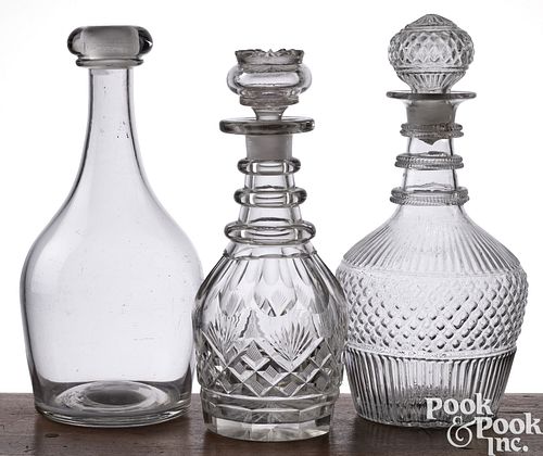 THREE BLOWN CLEAR GLASS