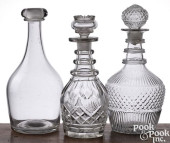 THREE BLOWN CLEAR GLASS DECANT