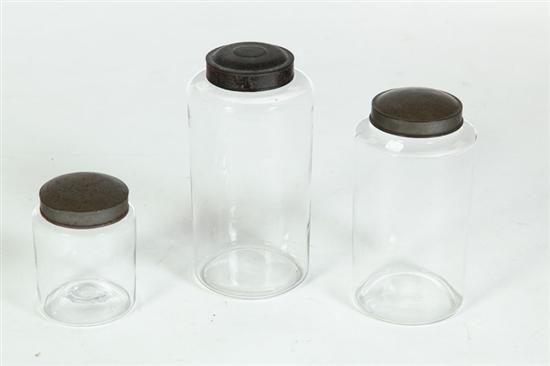 THREE BLOWN GLASS CANISTERS. 