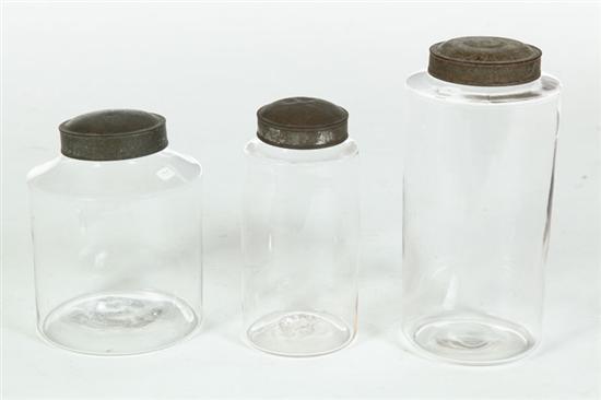 THREE BLOWN GLASS CANISTERS. 