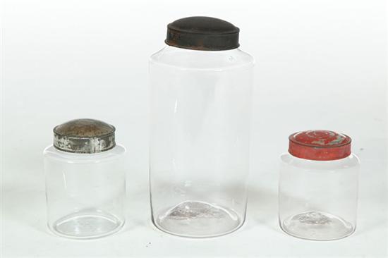 THREE BLOWN GLASS CANISTERS. 