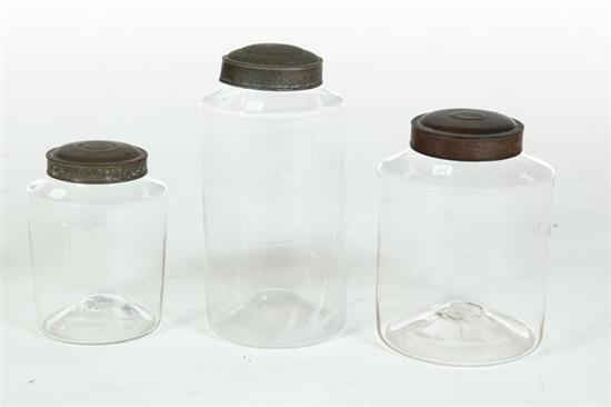 THREE BLOWN GLASS CANISTERS. 