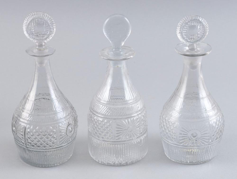 THREE BLOWN MOLDED CLEAR GLASS