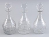 THREE BLOWN MOLDED CLEAR GLASS