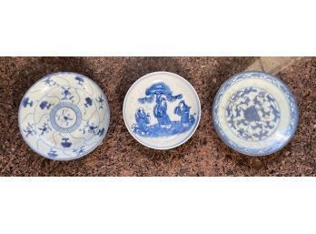 Three blue and white small
