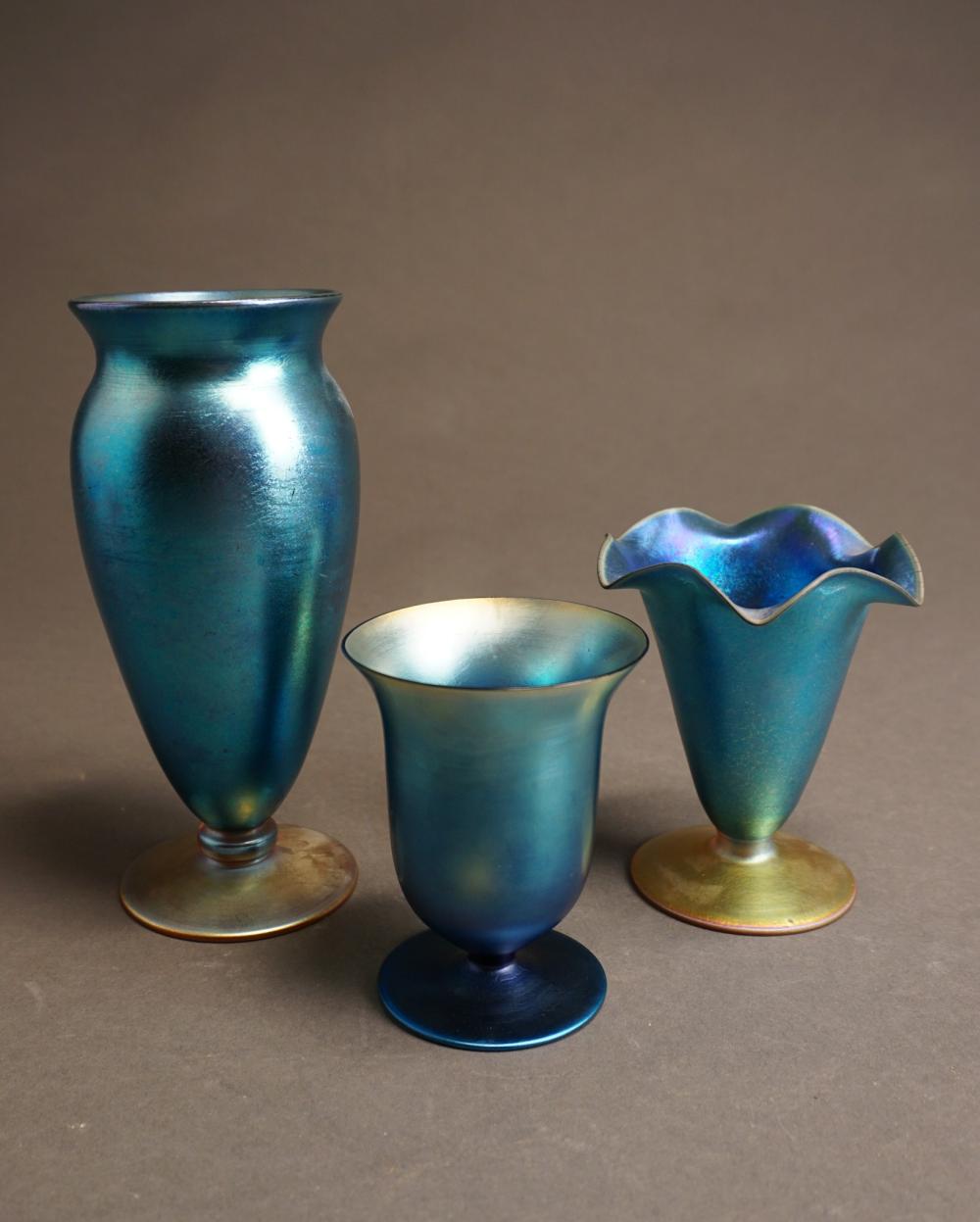THREE BLUE IRIDESCENT GLASS VASE,