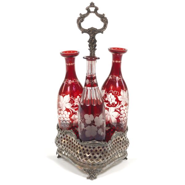THREE BOHEMIAN RUBY RED CRUET SET