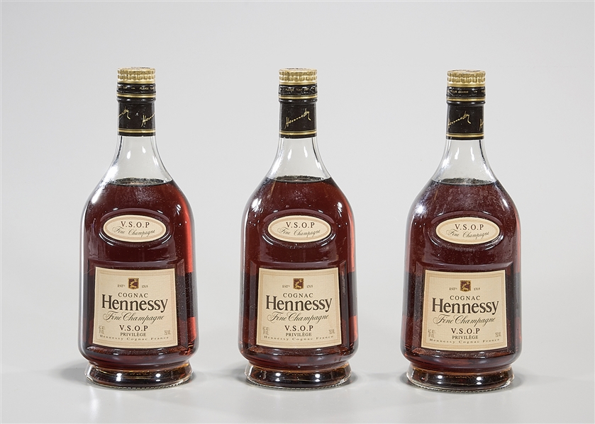 Three bottles of Hennessy VSOP