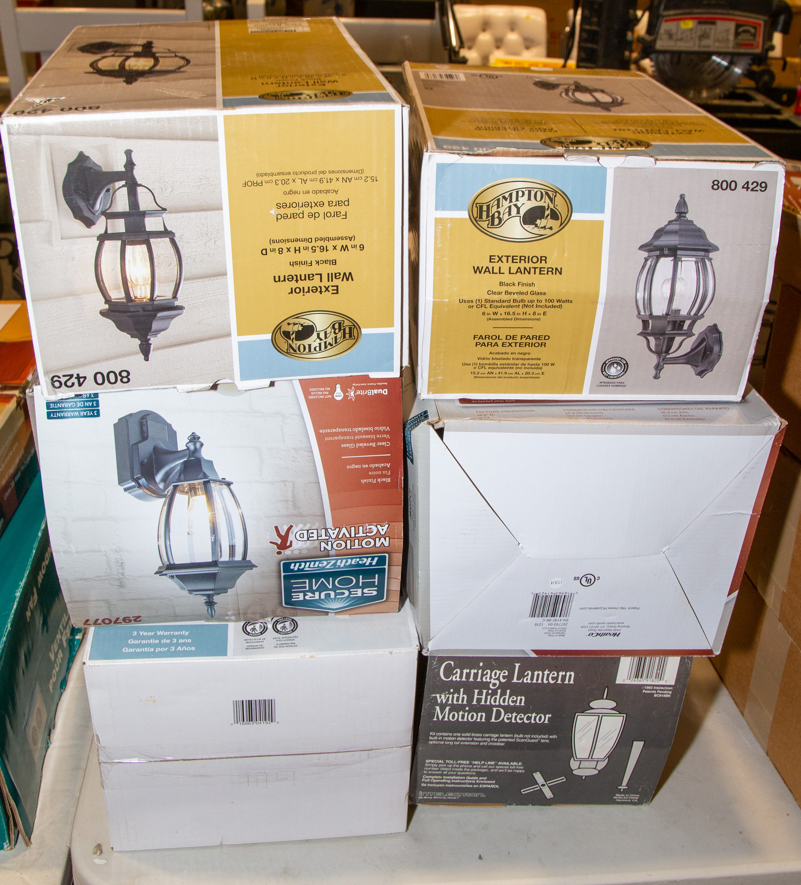 THREE BOXED PORCH LIGHTS .