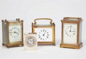THREE BRASS AND A SILVER CARRI