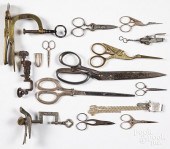 THREE BRASS AND IRON SEWING CL