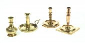 THREE BRASS CANDLESTICKS AND V