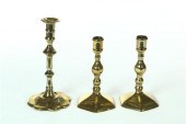 THREE BRASS CANDLESTICKS.  Pro