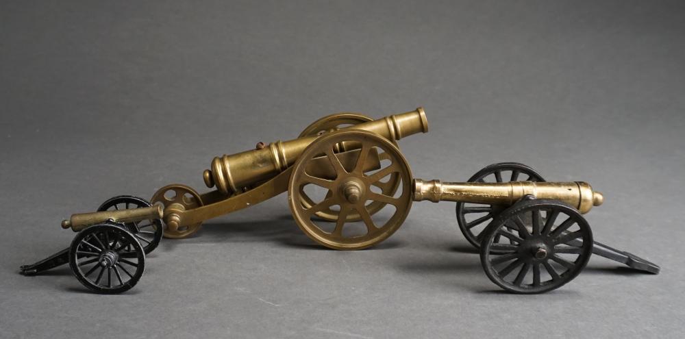 THREE BRASS CANON DESK