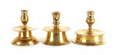 Three brass capstan candlestic