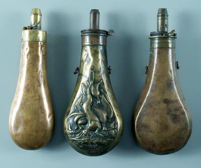 Three brass powder flasks: one