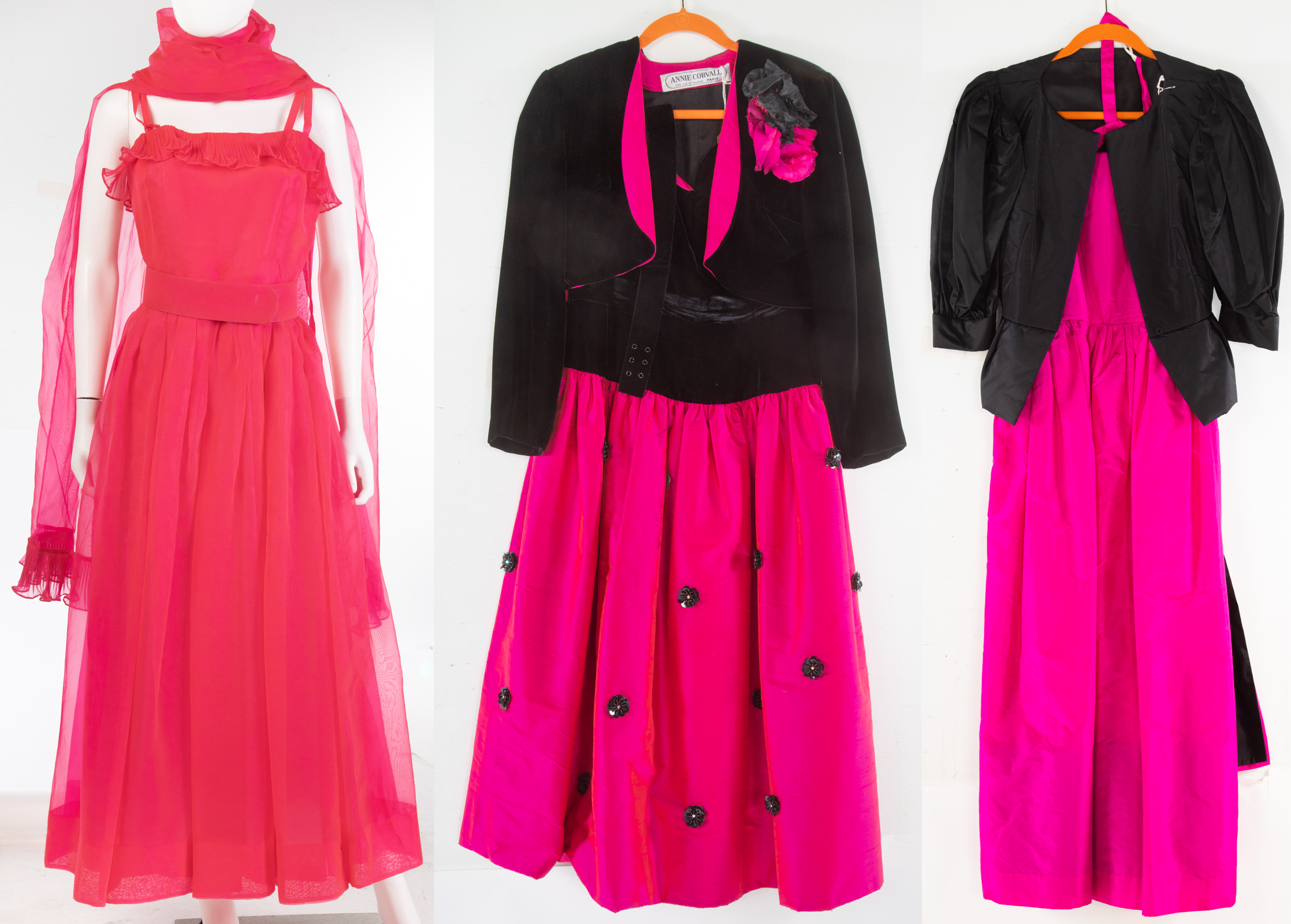 THREE BRIGHT PINK EVENING DRESSES .