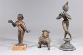 Three bronze cast statues of K