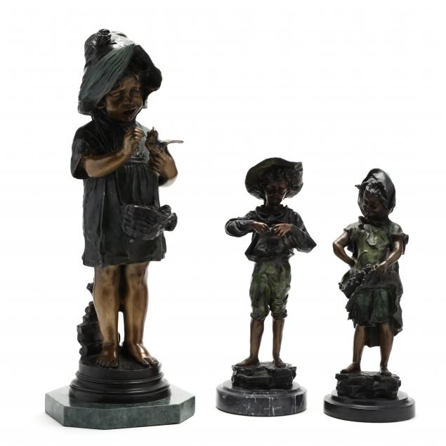 THREE BRONZE SCULPTURES OF CHILDREN