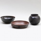 THREE BROWN EARTHENWARE VESSEL