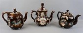 THREE BROWN TEAPOTS WITH FLORA