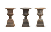 THREE CAMPAGNA CAST IRON GARDE