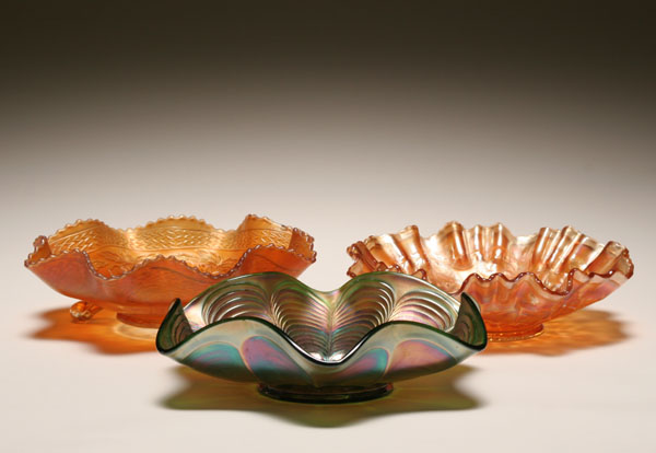 Three carnival glass bowls,