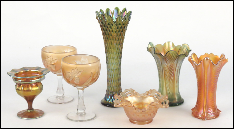 THREE CARNIVAL GLASS VASES.