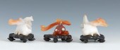 Three Carved Agate Fish on Sta