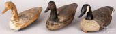 THREE CARVED AND PAINTED CANAD