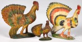 THREE CARVED AND PAINTED ROOST