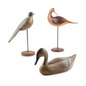 THREE CARVED AND POLYCHROMED B