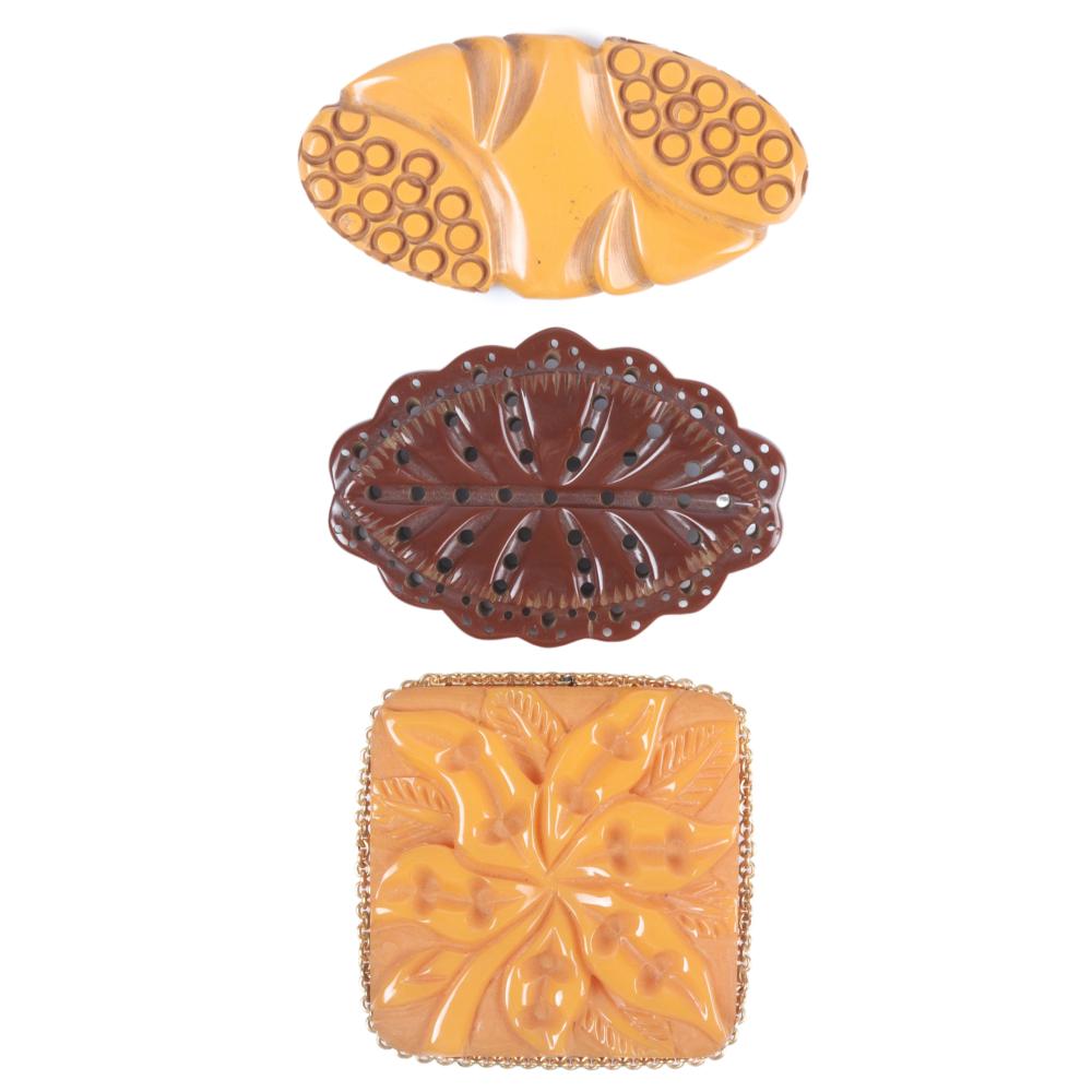 THREE CARVED BAKELITE PINS 2"H X