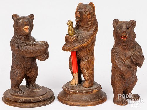 THREE CARVED BLACK FOREST BEARS,