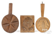 THREE CARVED BUTTER PRINTS, 19