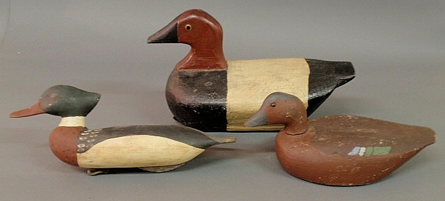 Three carved duck decoys largest
