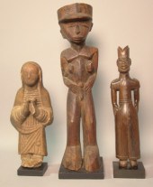THREE CARVED FIGURES including
