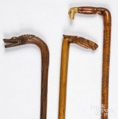 THREE CARVED FOLK ART CANESThr
