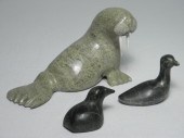 Three carved Iqaluit stone scu