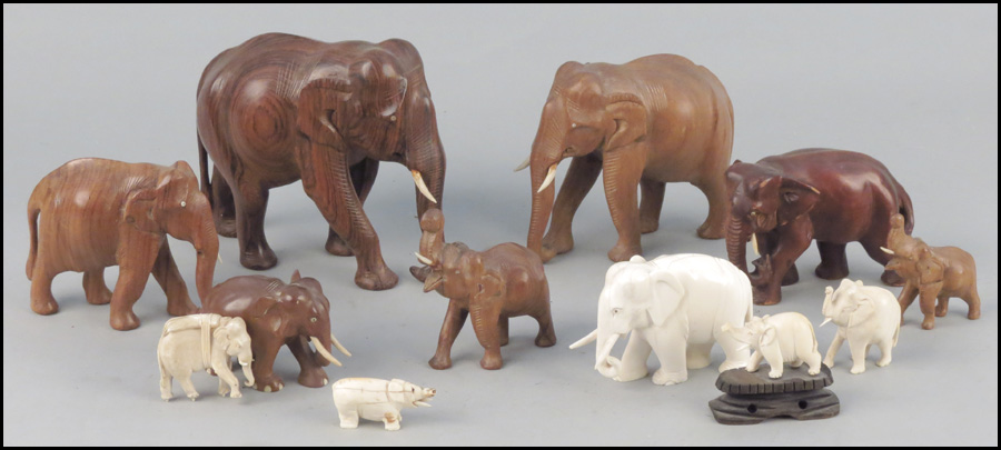 THREE CARVED IVORY ELEPHANTS.