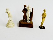THREE CARVED IVORY FIGURES.  E