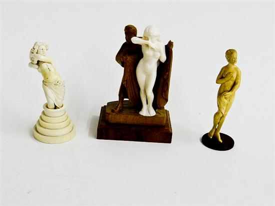 THREE CARVED IVORY FIGURES. 
