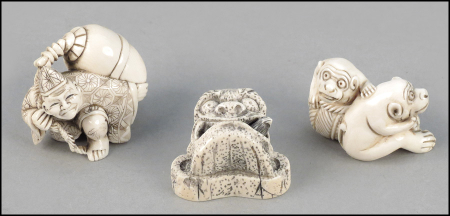 THREE CARVED IVORY NETSUKE. All