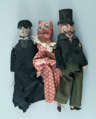 Three carved, painted wooden