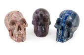 THREE CARVED SEMI-PRECIOUS STO