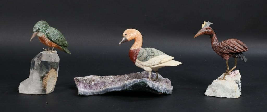 THREE CARVED STONE BIRD