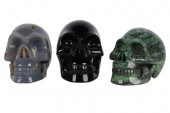 THREE CARVED STONE SKULLScompr